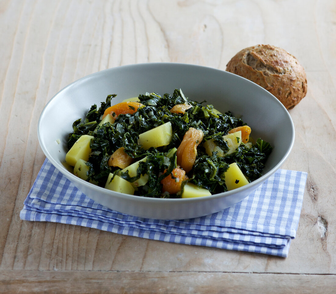Kale and potato stew in bowl