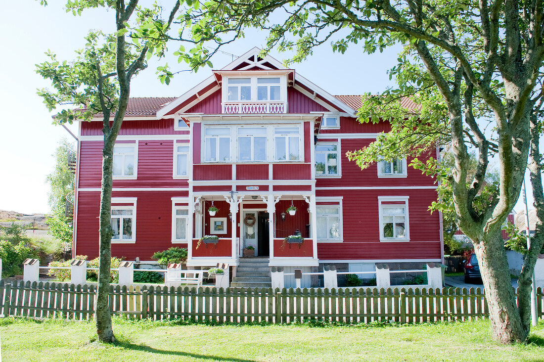 Facade of red Strandflickorna guest house at Lysekil, Sweden