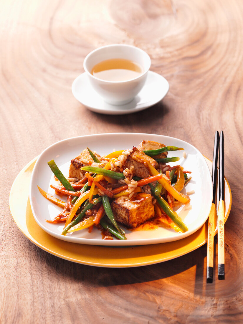 Asian tofu with vegetables on plate