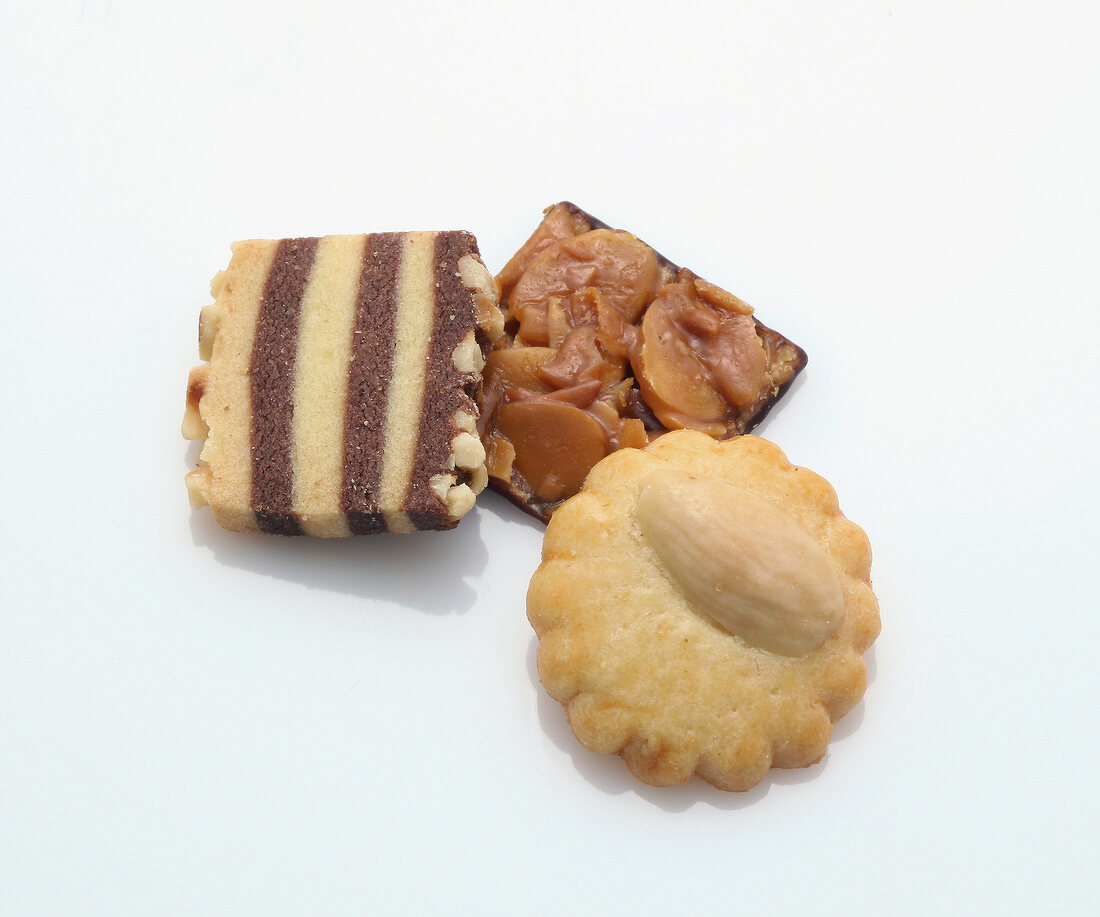 Close-up of biscuits and cookies on white background