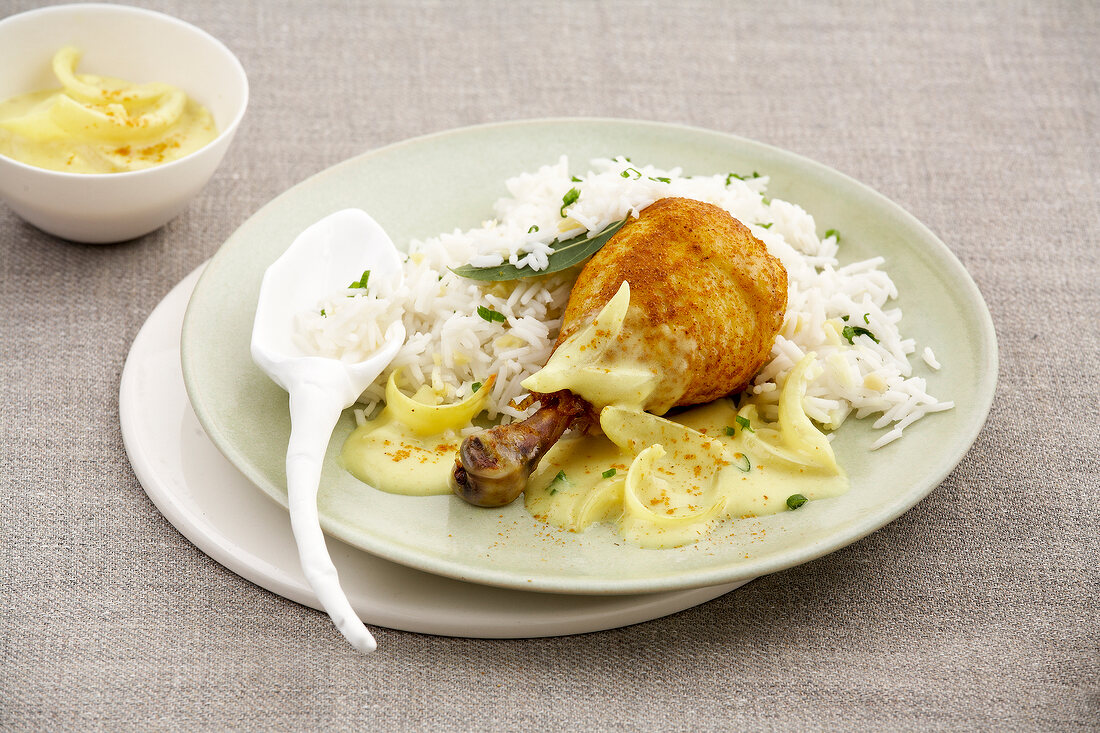 Chicken curry with rice on plate