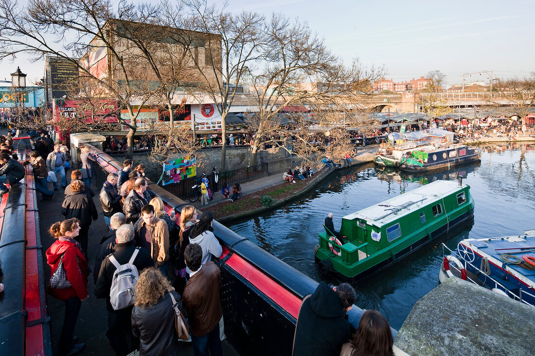 People standing on bridge of Camden Market, London, UK