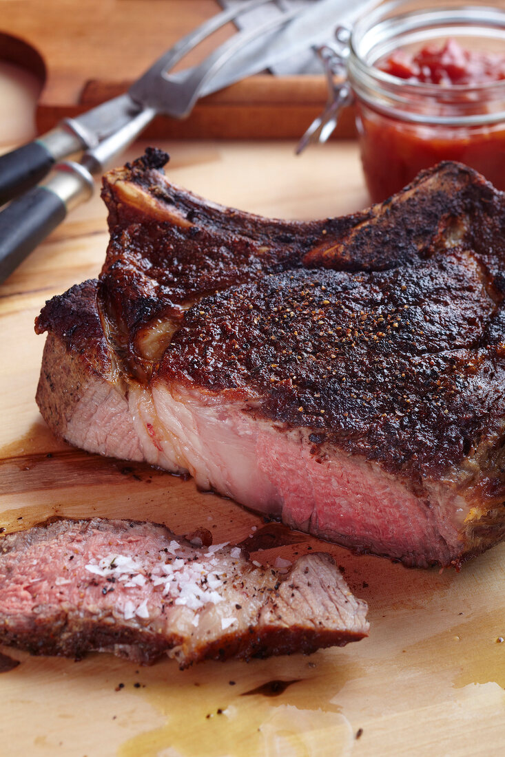 Close-up of an Ox chop with tomato relish at court Ivo & Co, Westerland