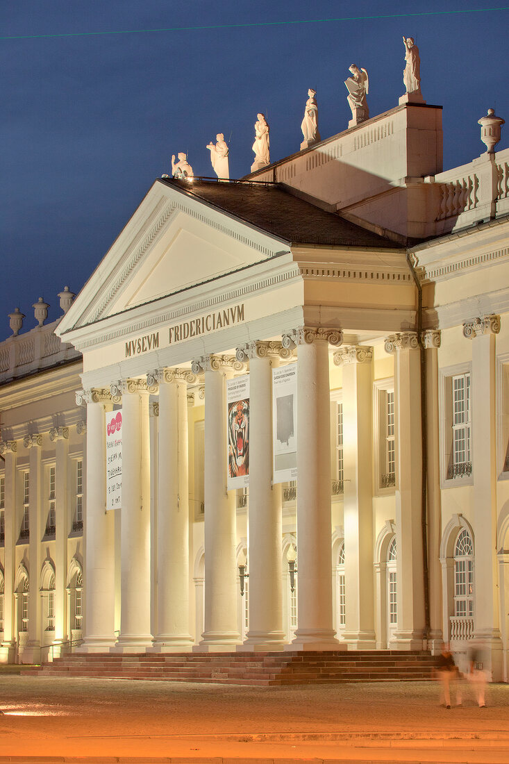 Facade of Fridericianum illuminated in evening, Kassel, Hessen, Germany