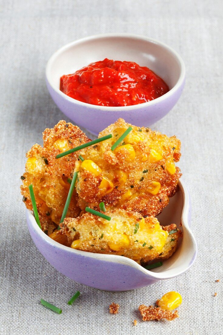 Corn cakes with a tomato dip