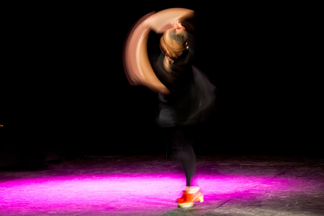 Blur motion of dancer on stage Antigel festival, Collonge-Bellerive, Switzerland