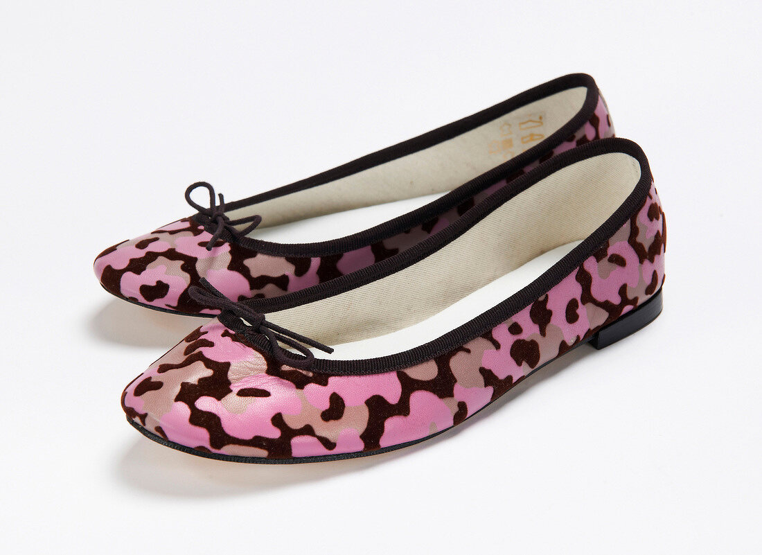 Army patterned pink ballerinas on white background