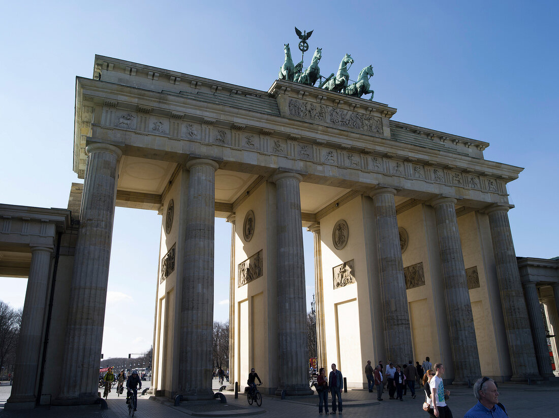 View of Historic Brandenburg gate and tourist, Mitte, Berlin, Germany