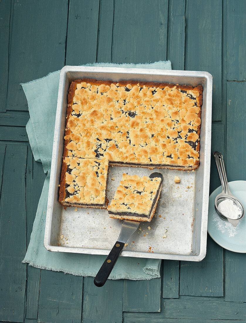 Poppy seed streusel sheet cake in baking tray