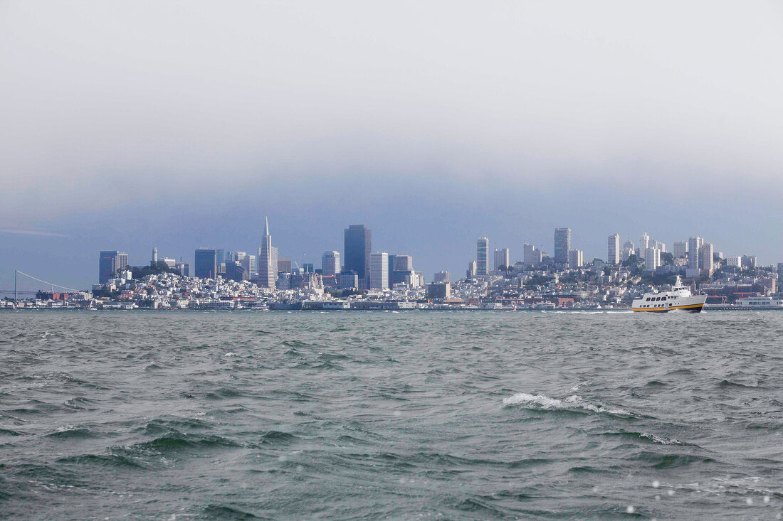 View of Cityscape with skyline and sailing boat on Pacifica Ocean in San Francisco, USA