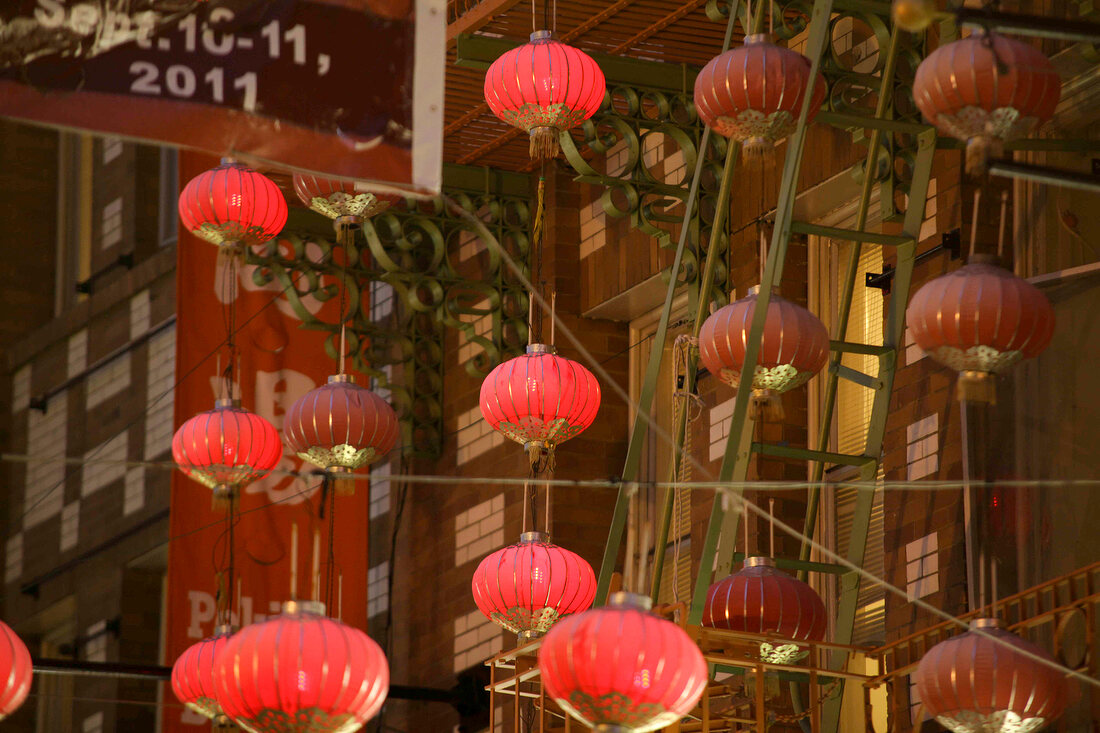 Chinese lanterns near facade of Chinatown in San Francisco, California, USA