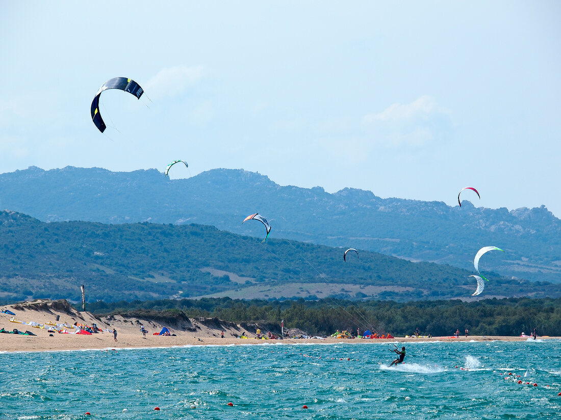 People kite surfing at Porto Puddu, Sardinia, Italy