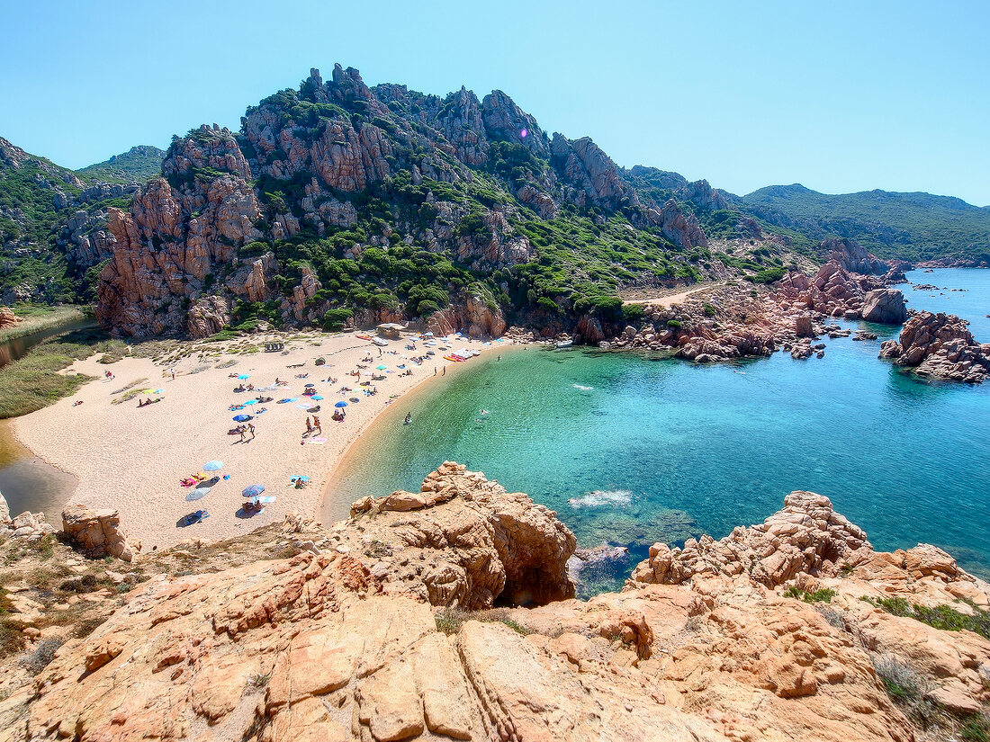 People at Li Cossi beach, Costa Paradiso, Sardinia, Italy