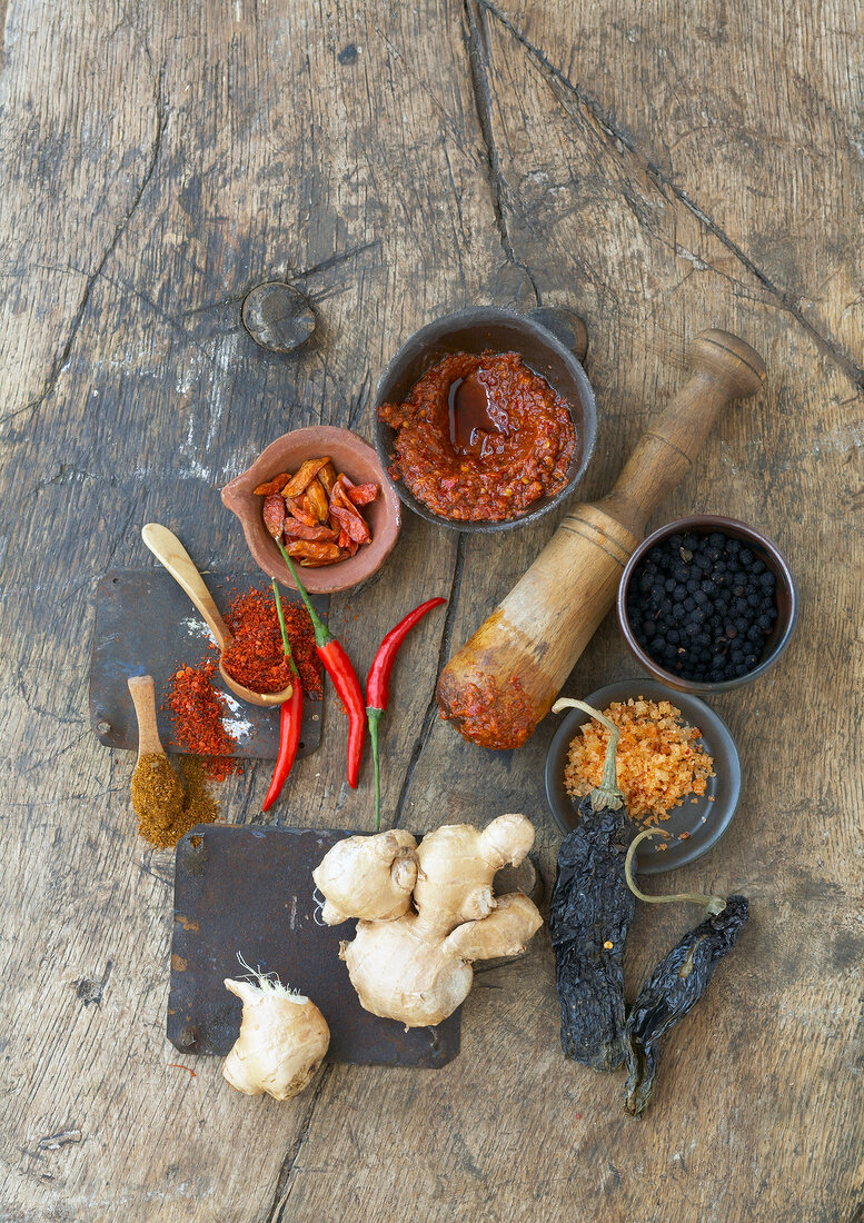 Variety of spices on wooden platform