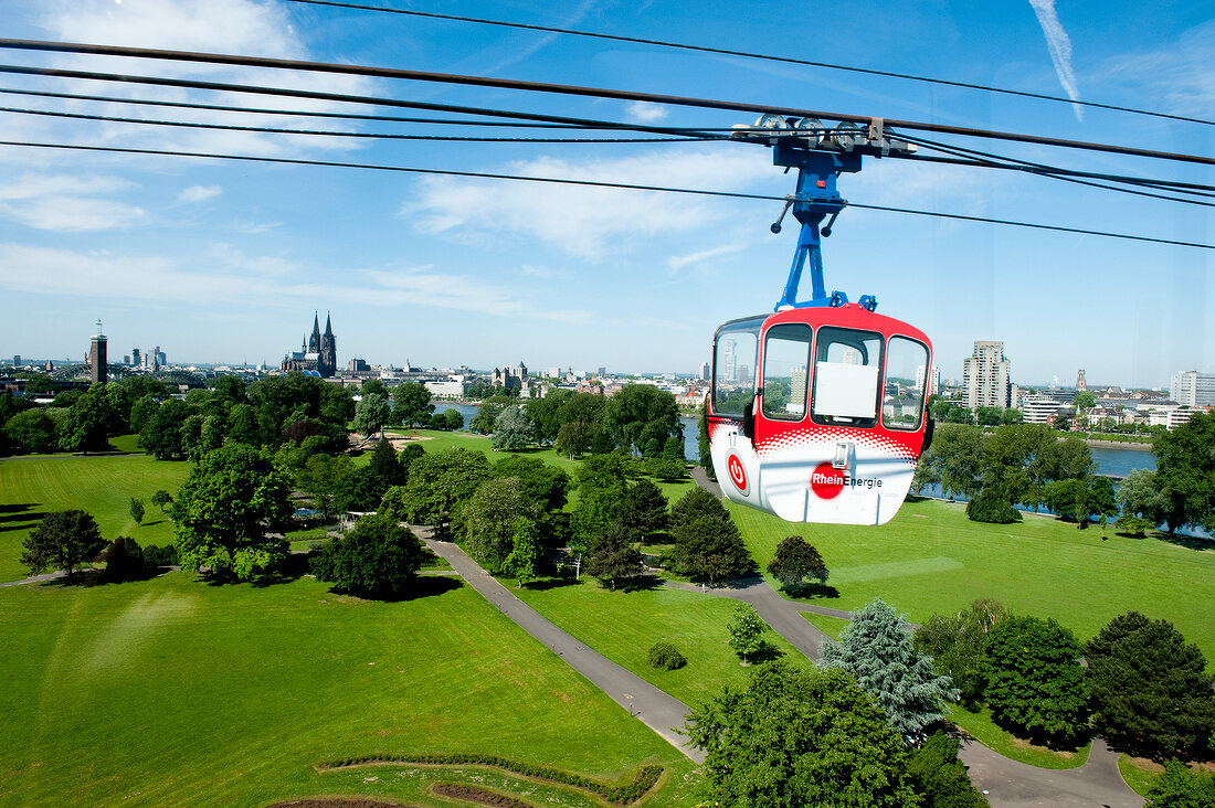 View of city and cable car in Rheinpark, Cologne, Germany
