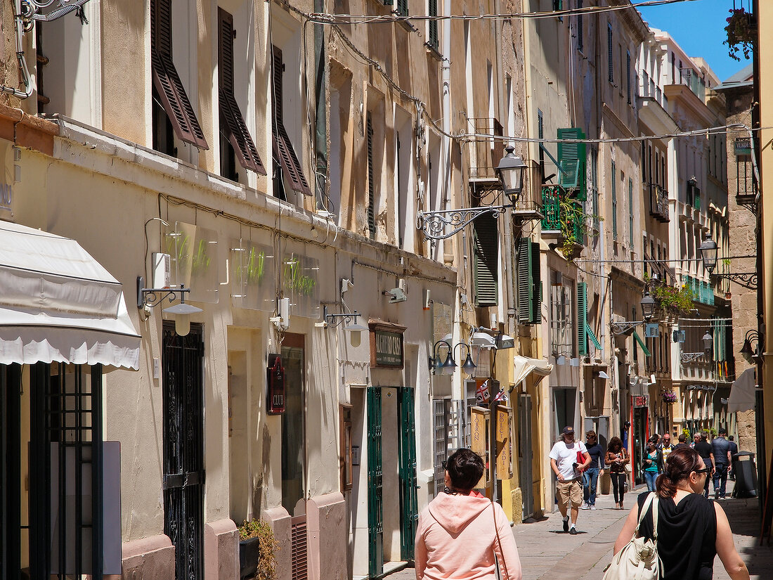 People on street in Alghero, Sardinia, Italy