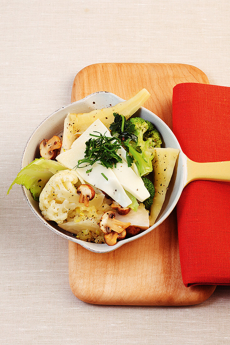 Vegetable salad with mushroom and herb in pan