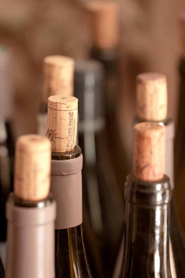 Close-up of wine bottle with corks, France