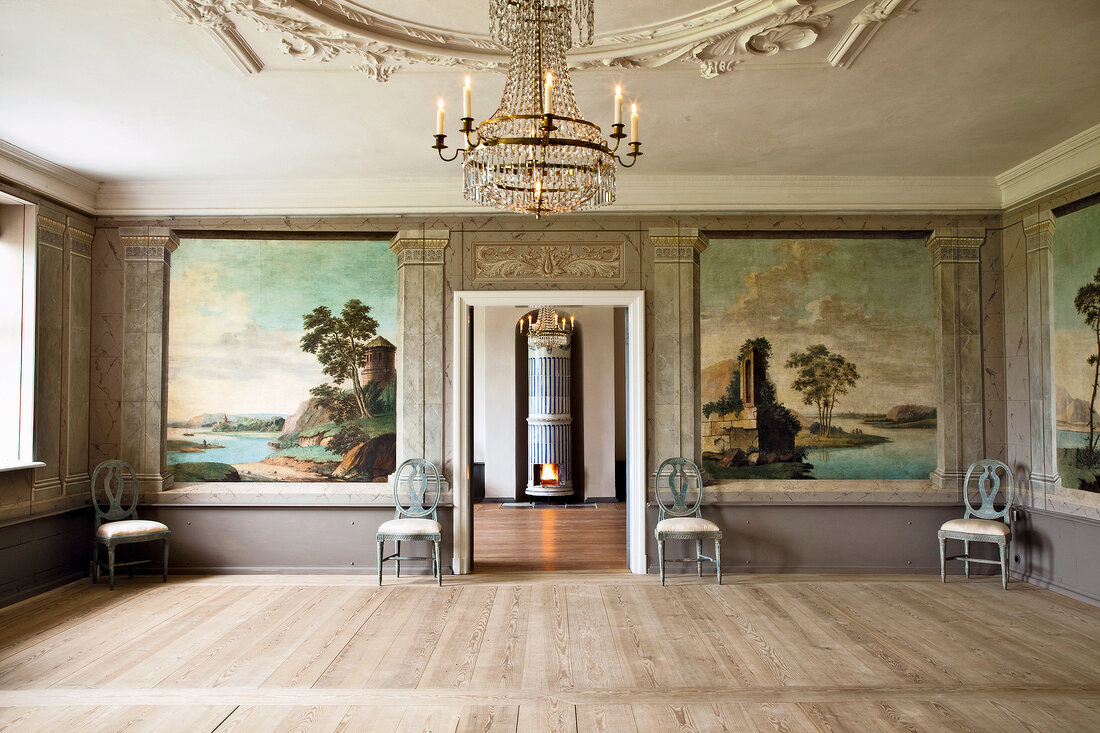 Interior of piano nobile with painted wallpapers in Gutshaus Boldevitz, Germany