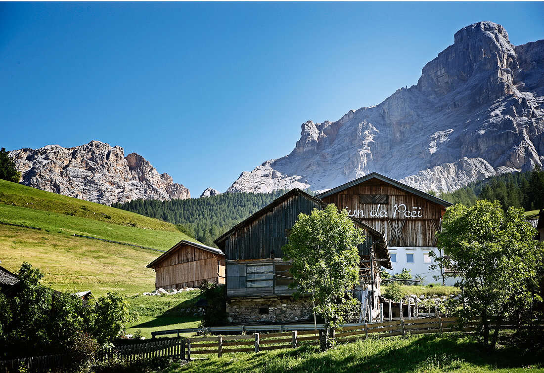 View of house and mountains in Luch da Pcei, Italy