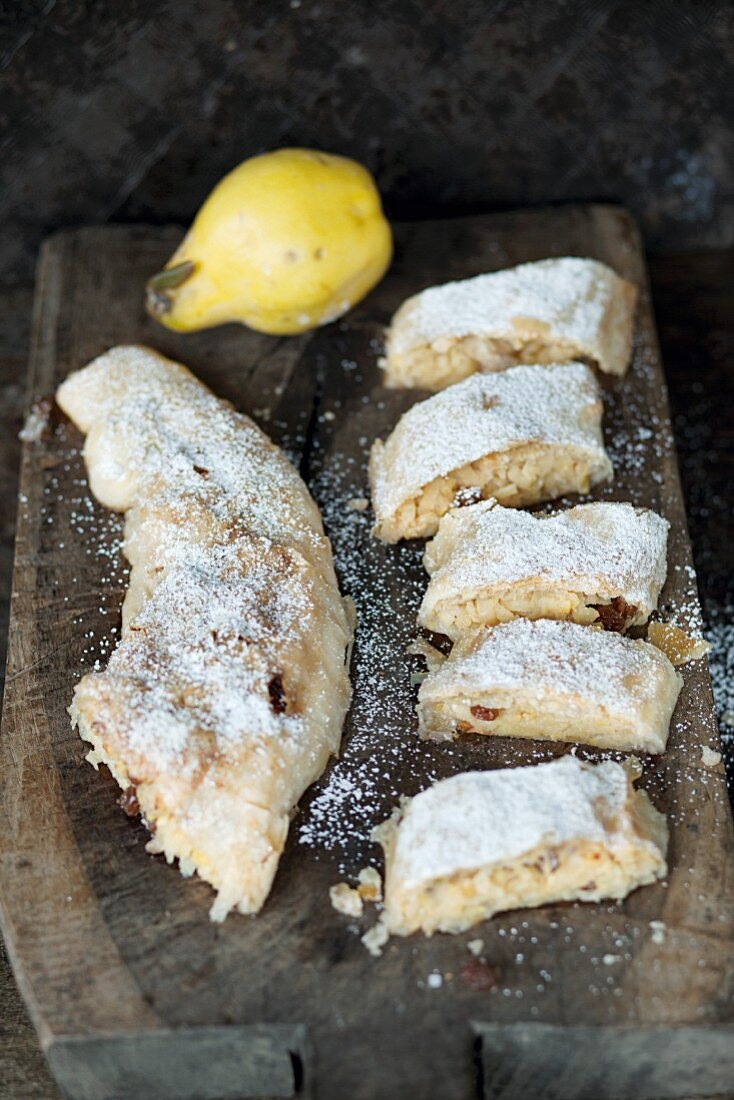 Quince strudel with icing sugar