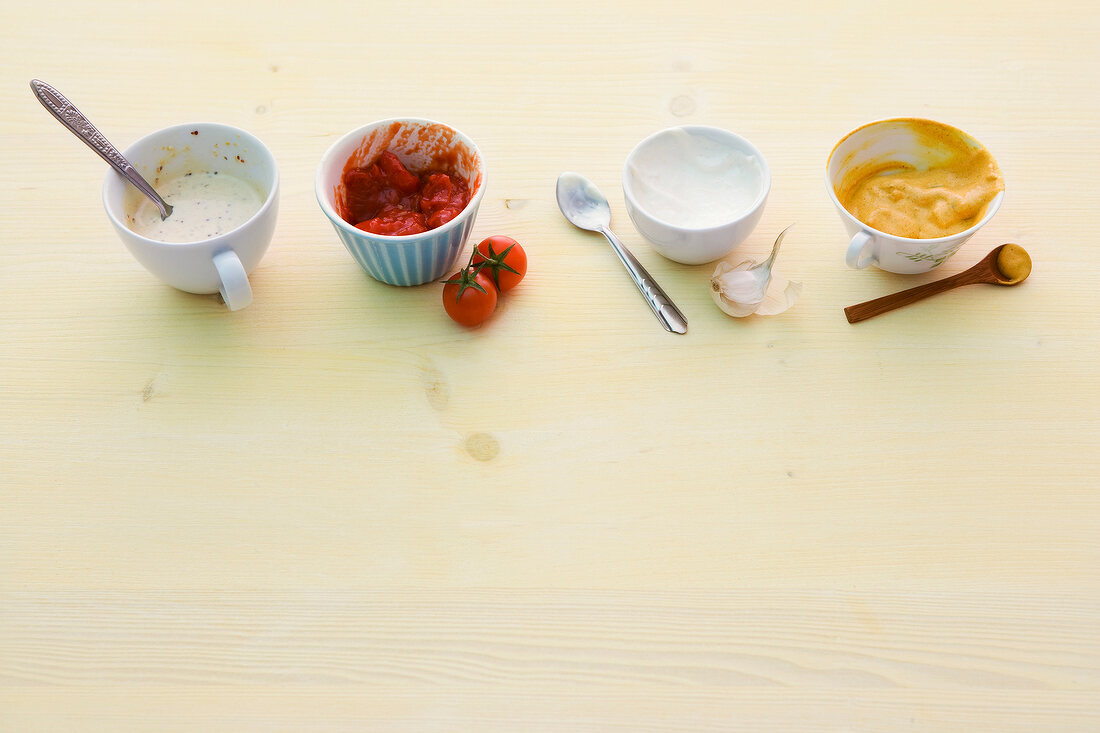 Four different sauces for barbecue in bowls