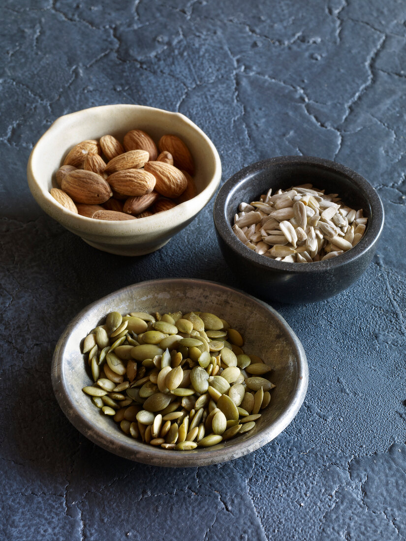 Almonds and other nuts in bowls