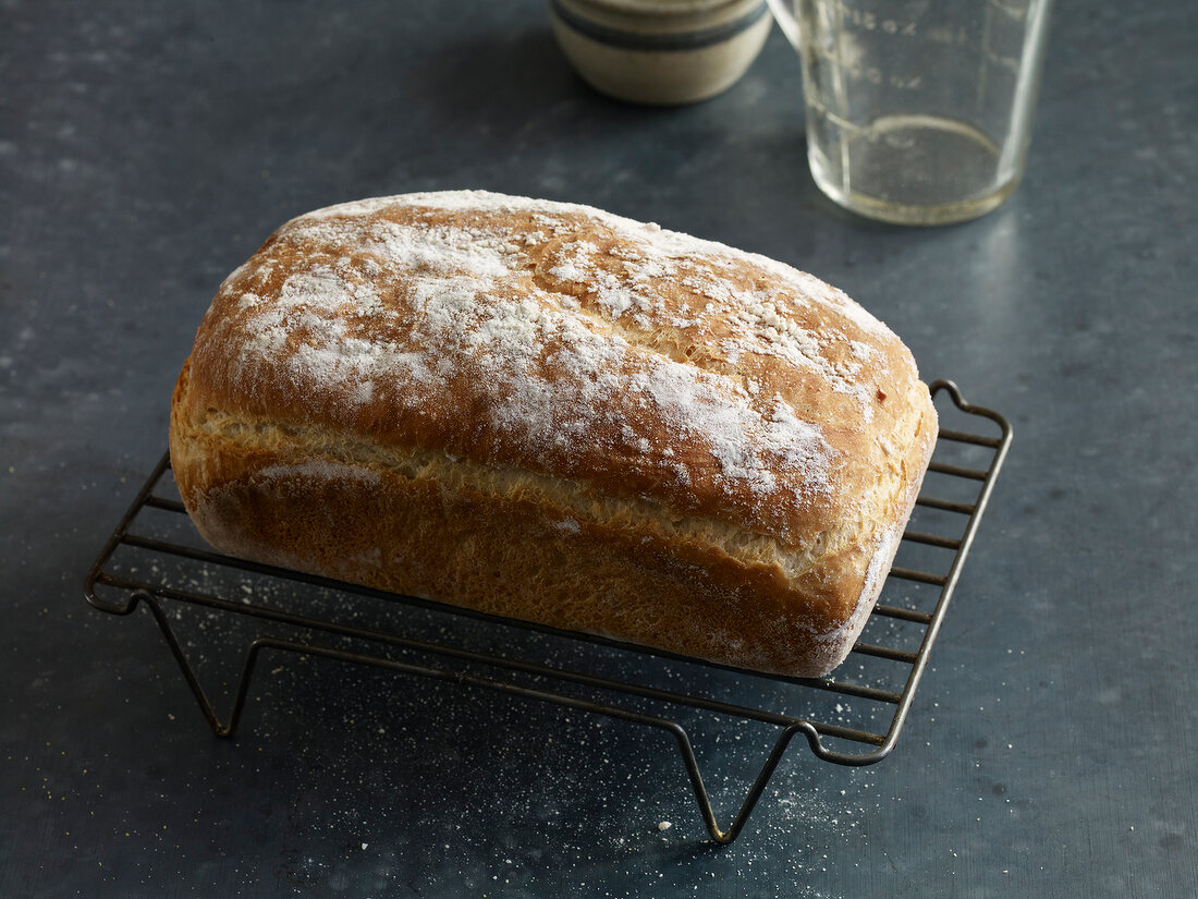 Loaf of white yeast bread on oven rack