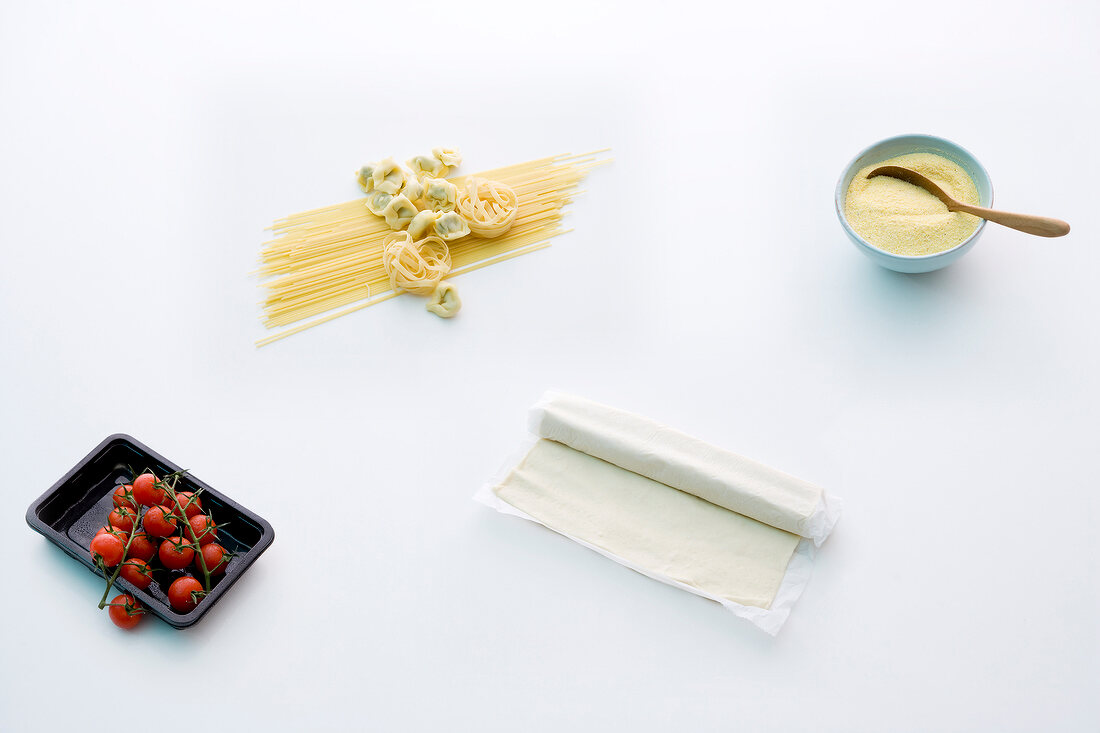 Four different Italian ingredients on white background