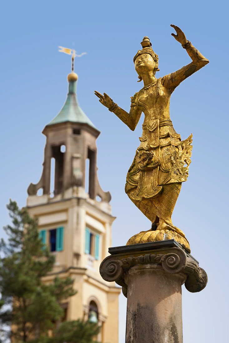 Statue of Burmese dancer in Portmeirion village, Gwynedd, Wales, UK