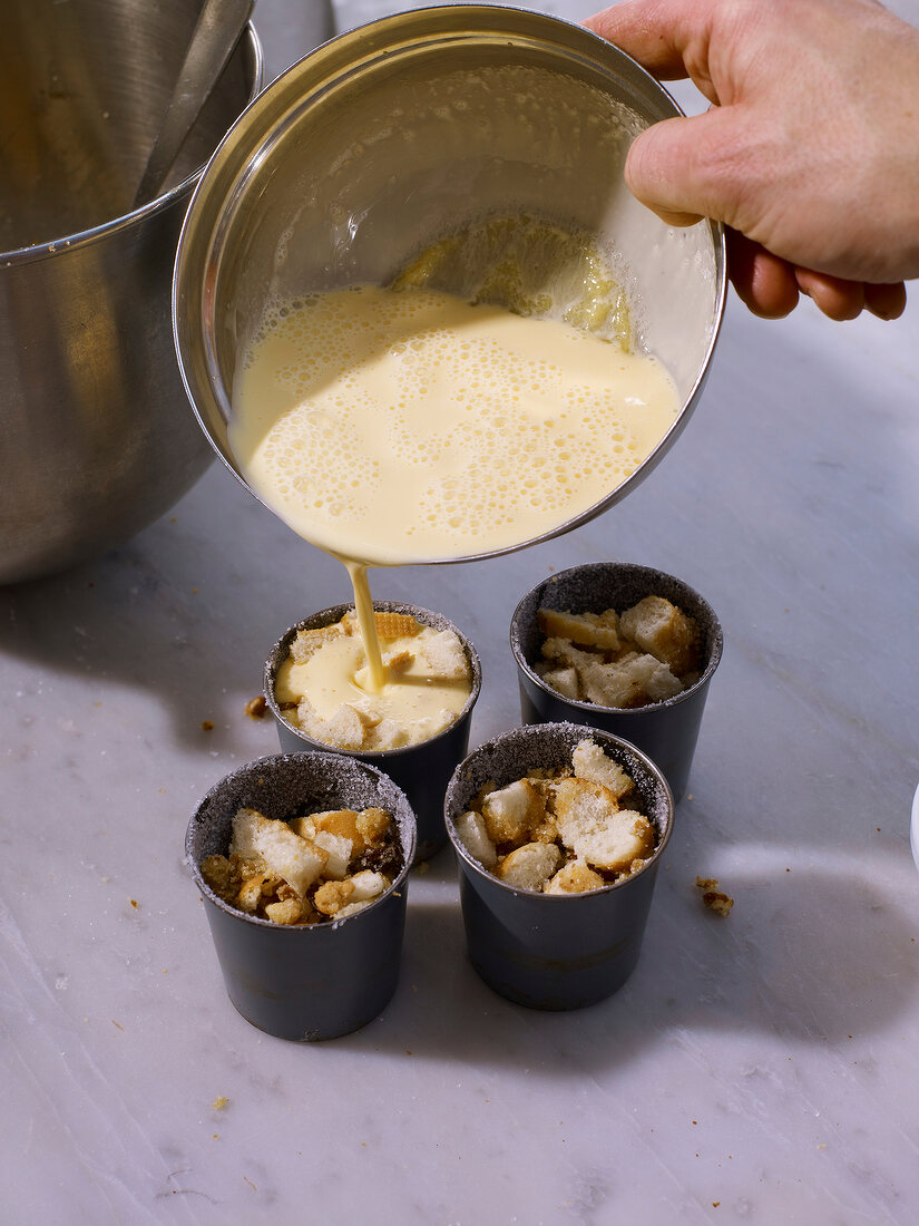 Bread pudding with apple sabayon and egg cream in baking cup