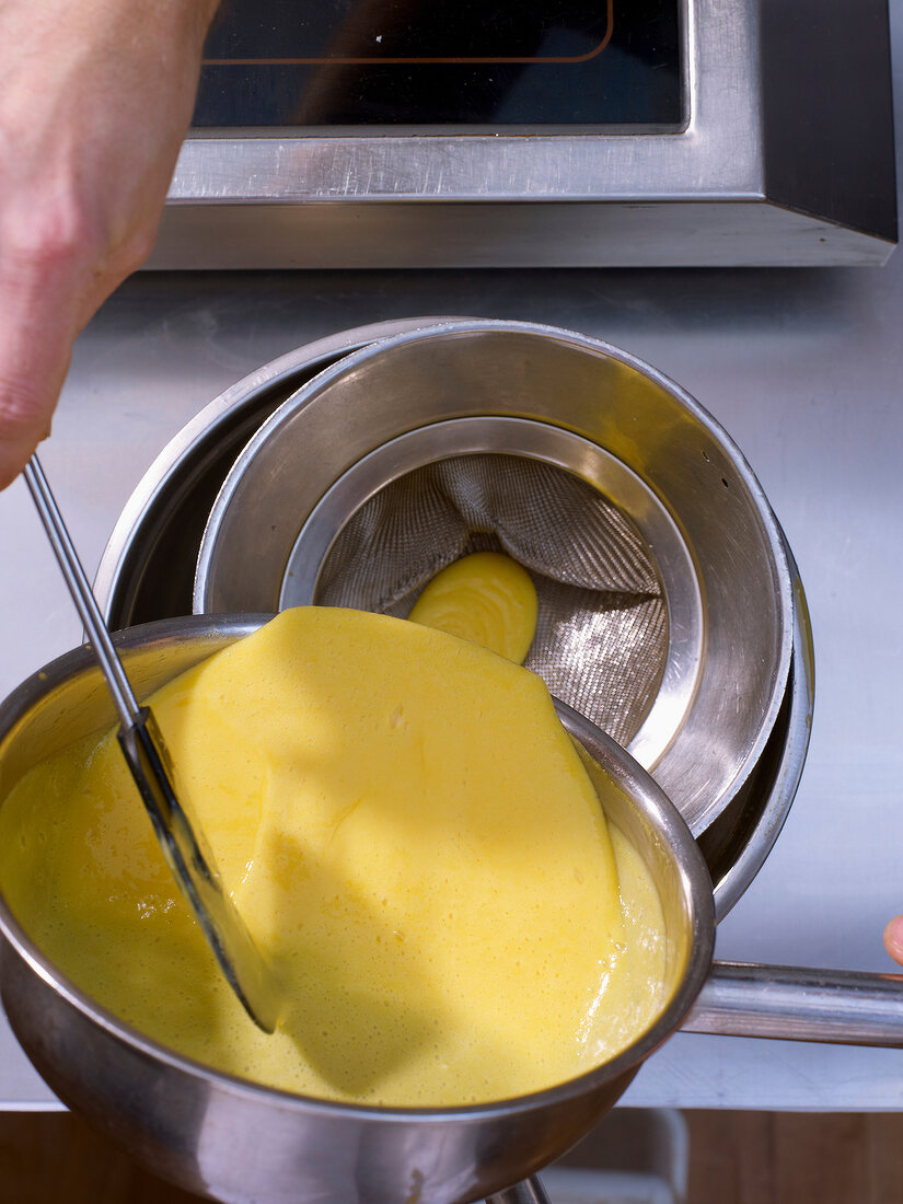 Passion fruit cream passed through a sieve, overhead view