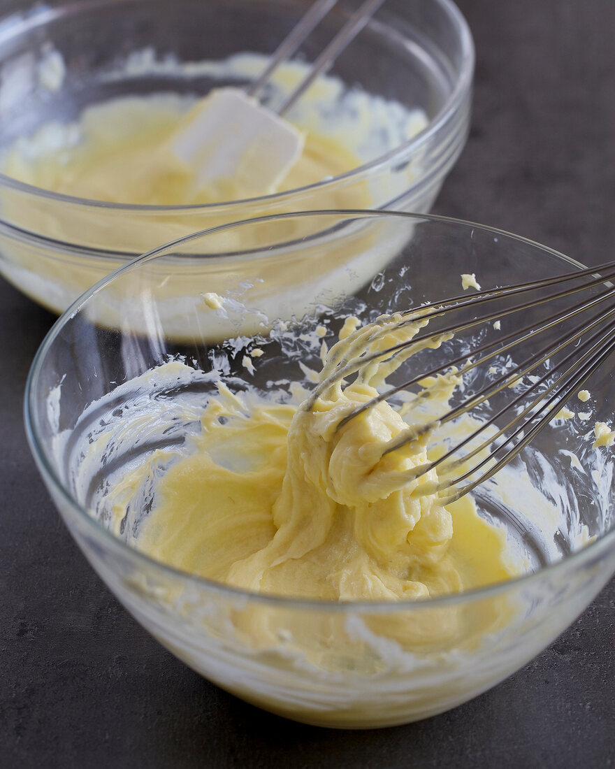 Butter whisked in bowl for preparing guava and lime truffle, step 2