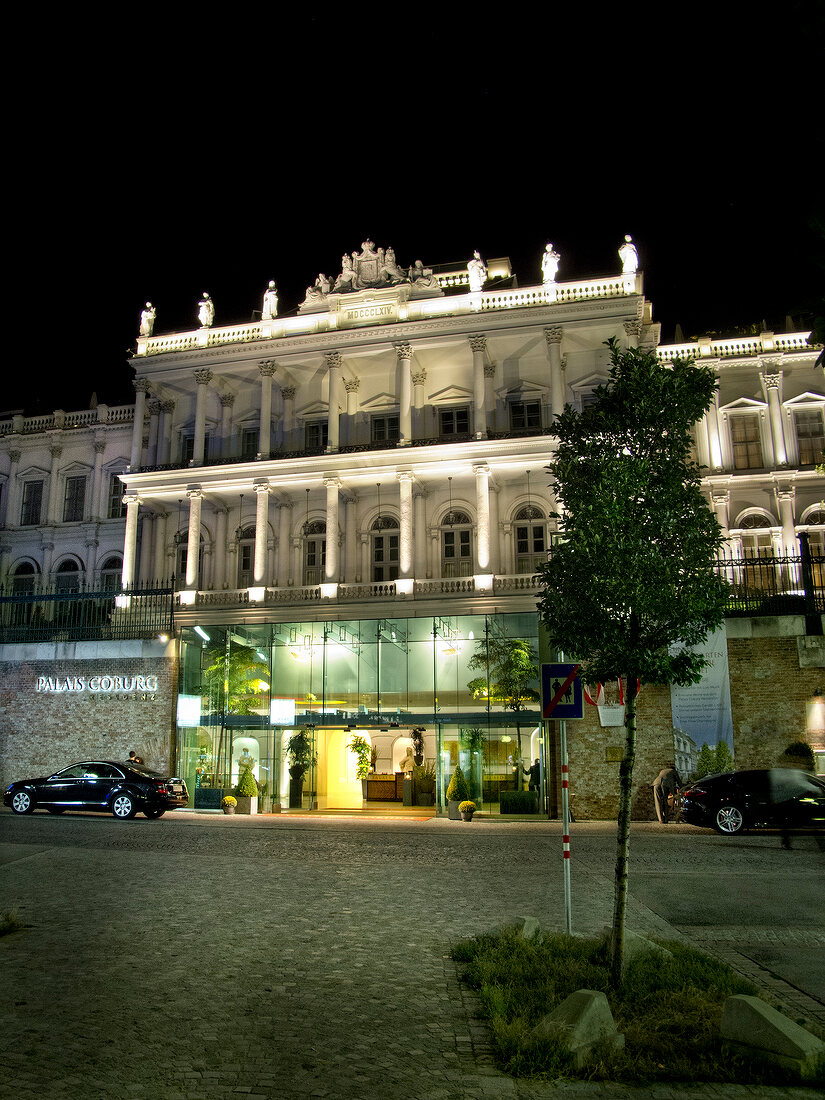 Facade of illuminated Palais Coburg, Vienna, Austria