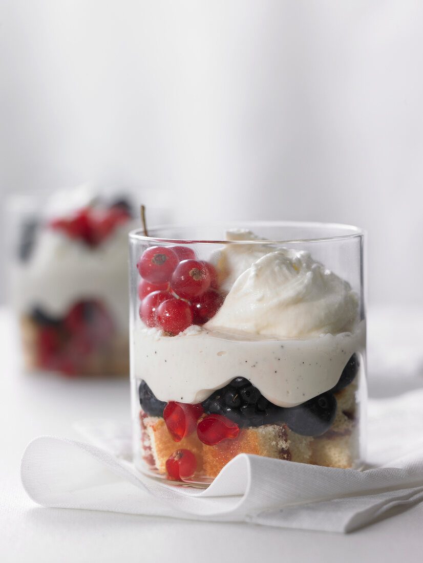 Red berry trifle in glass cup