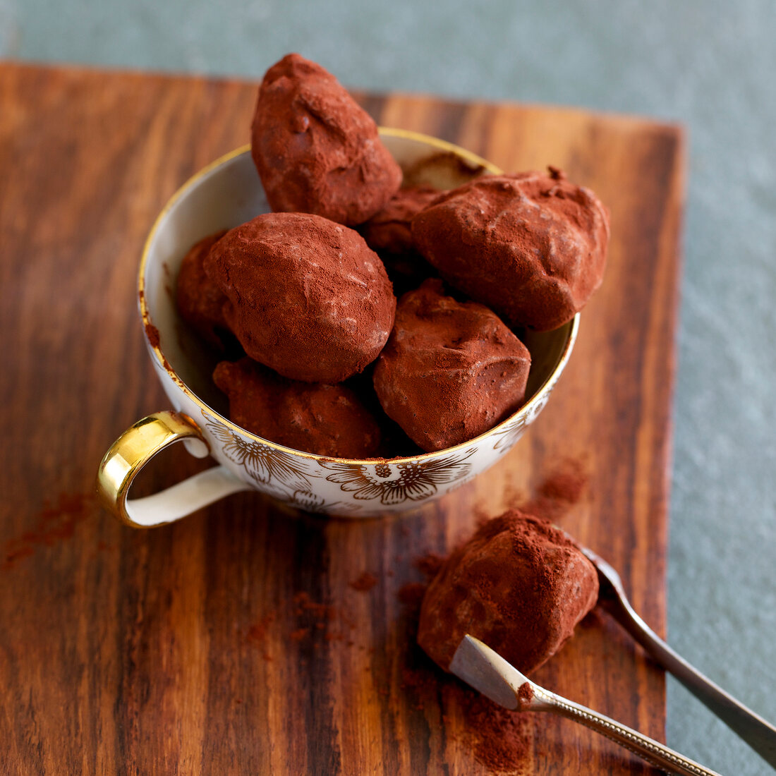 Stuffed chocolate prunes in cup