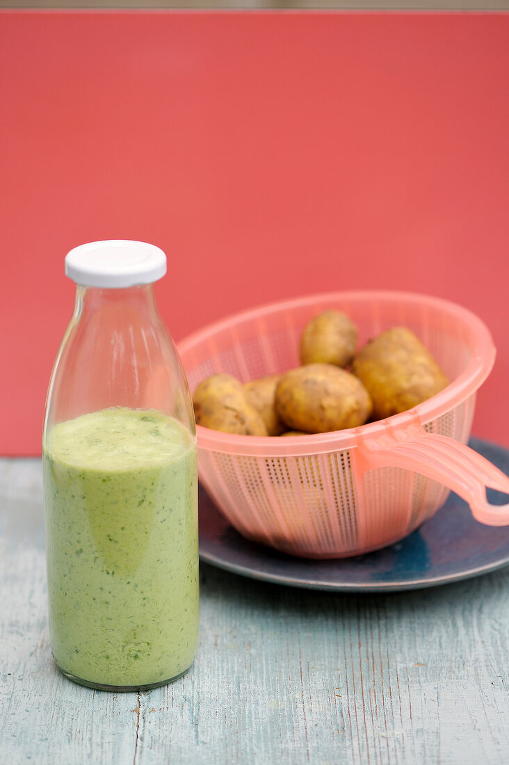 Spinach and yogurt sauce in bottle