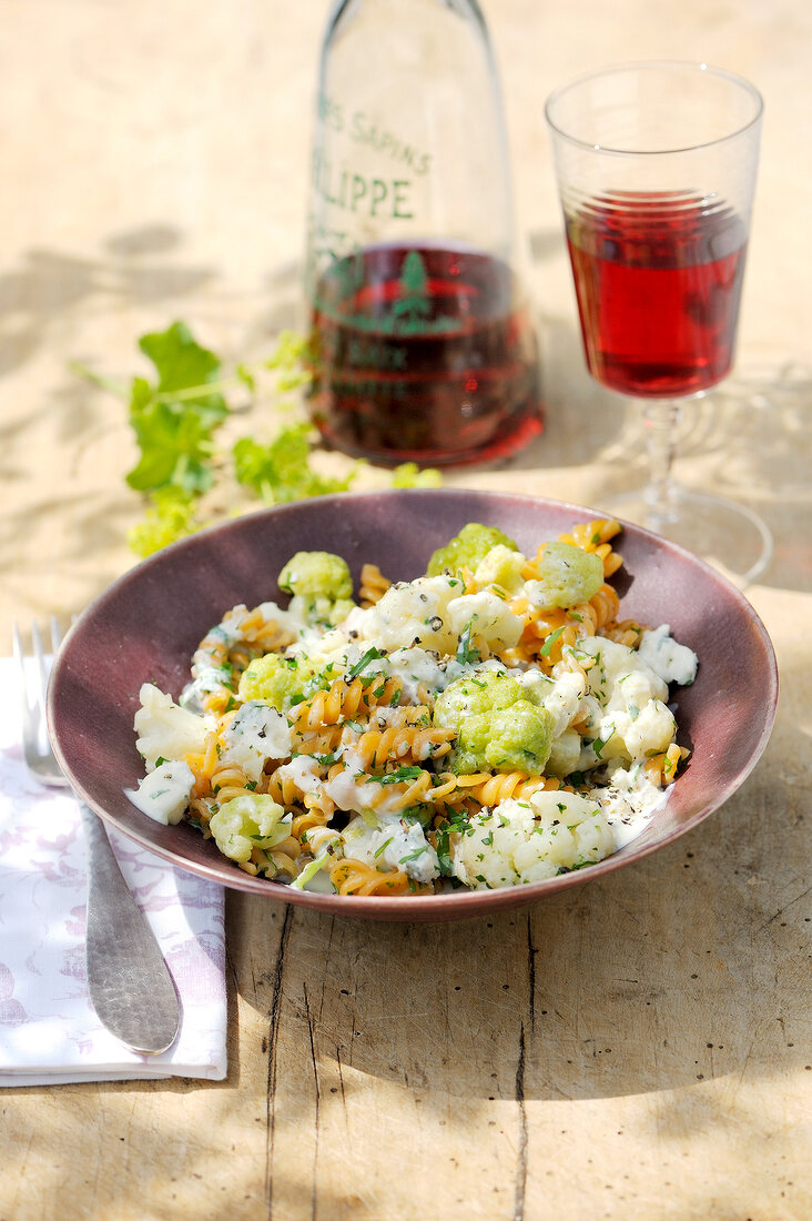 Cauliflower with pasta and cheese pasta in bowl