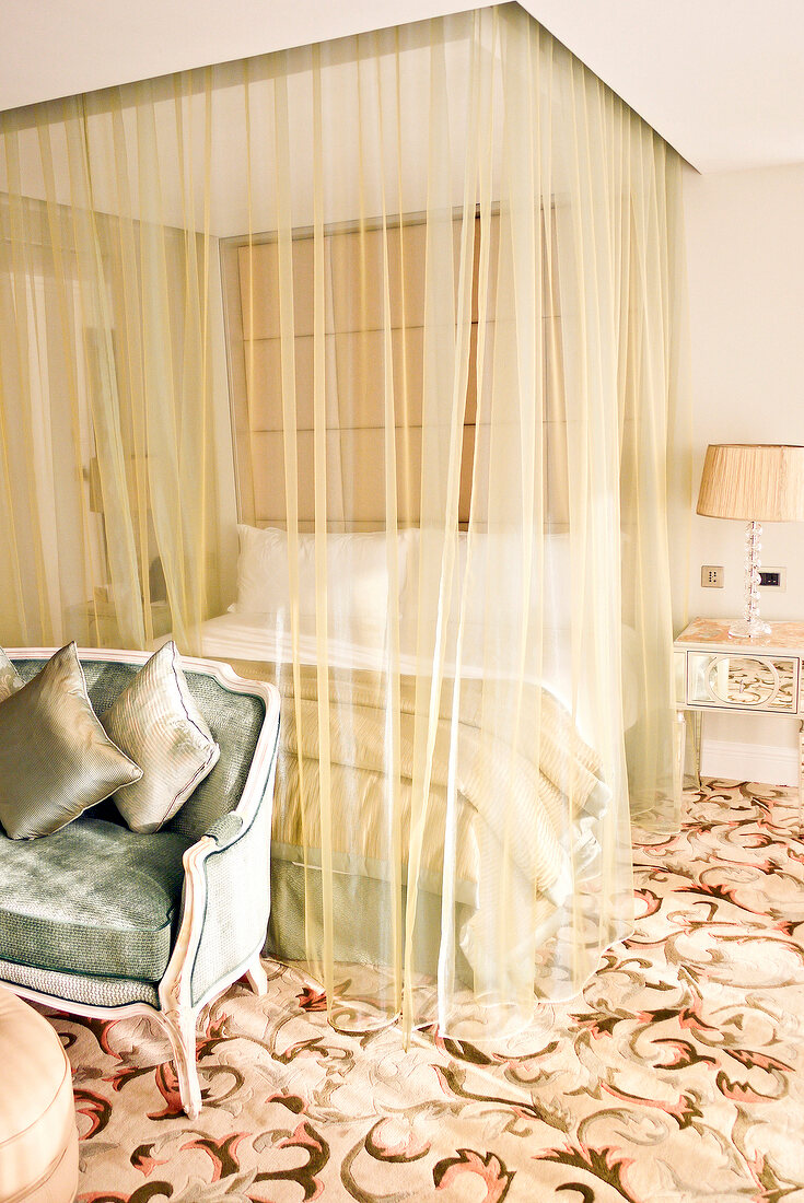 Bedroom with bed under canopy in InterContinental Phoenicia Beirut Hotel, Beirut, Lebanon