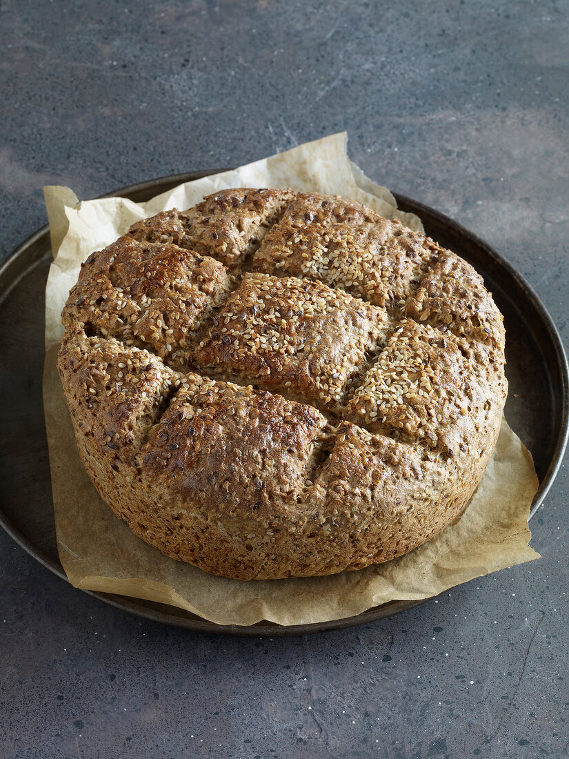 Grain groat bread in baking tray