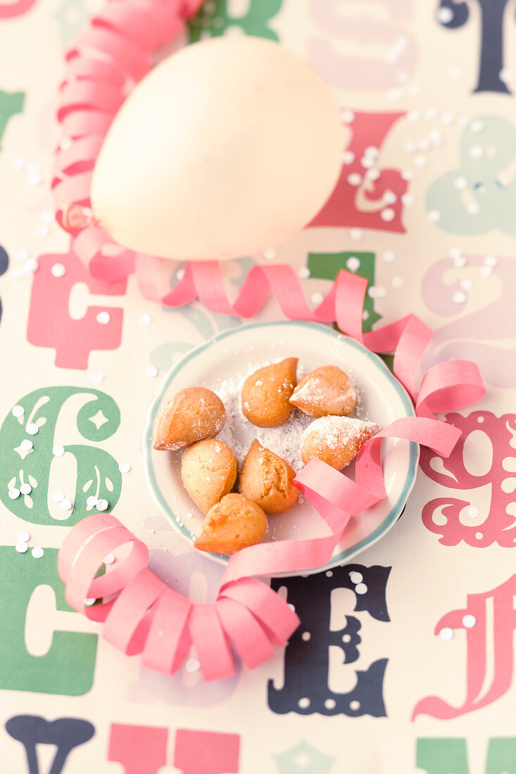 Mutzen almonds on plate with decoration on table