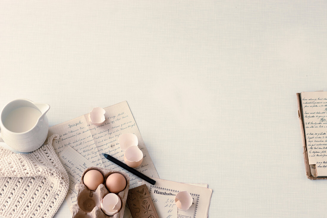 Overhead view of baking recipes and ingredients