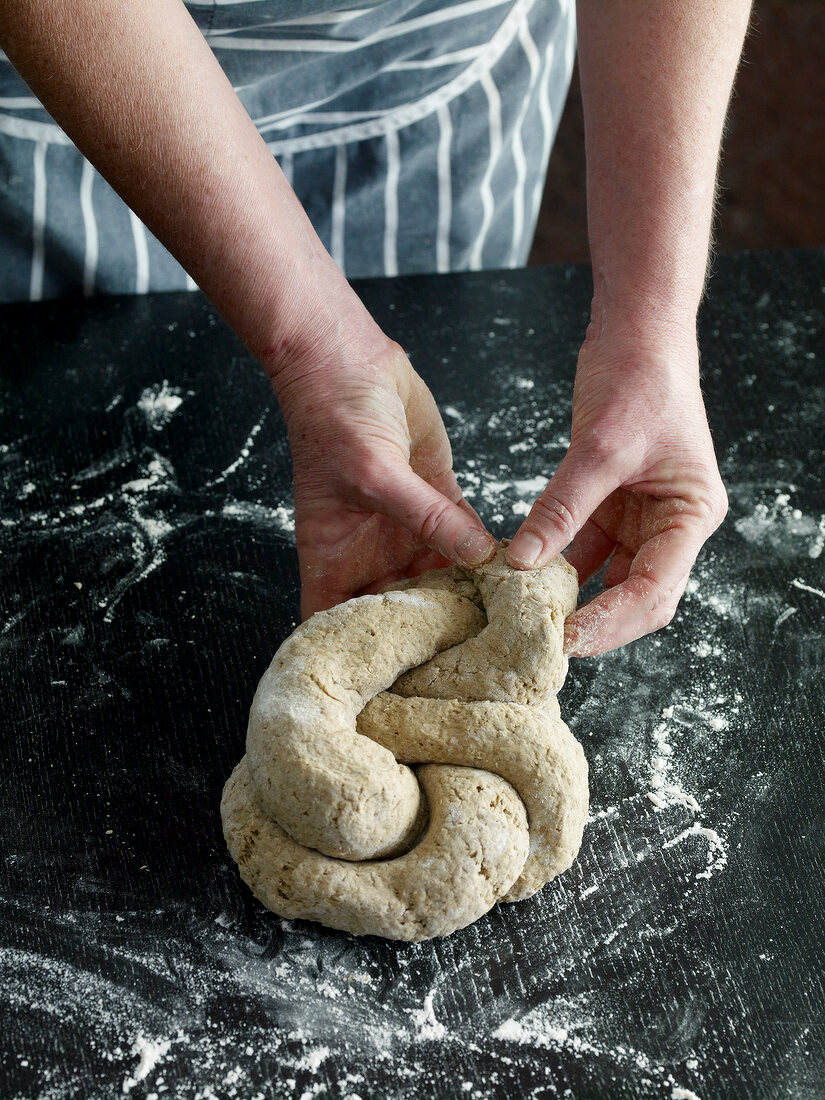 Close-up of twisting dough, step 3