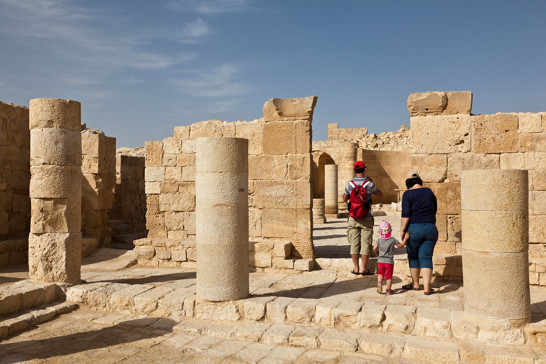 Rear view of people in Nabatean temple, Avdat National Park, Negev, Israel