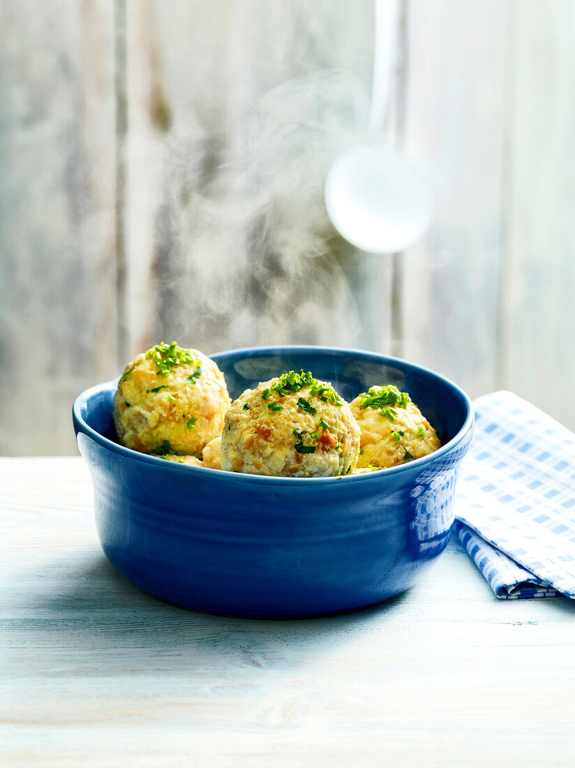 Hot bread dumplings in blue bowl, Bavaria, Germany