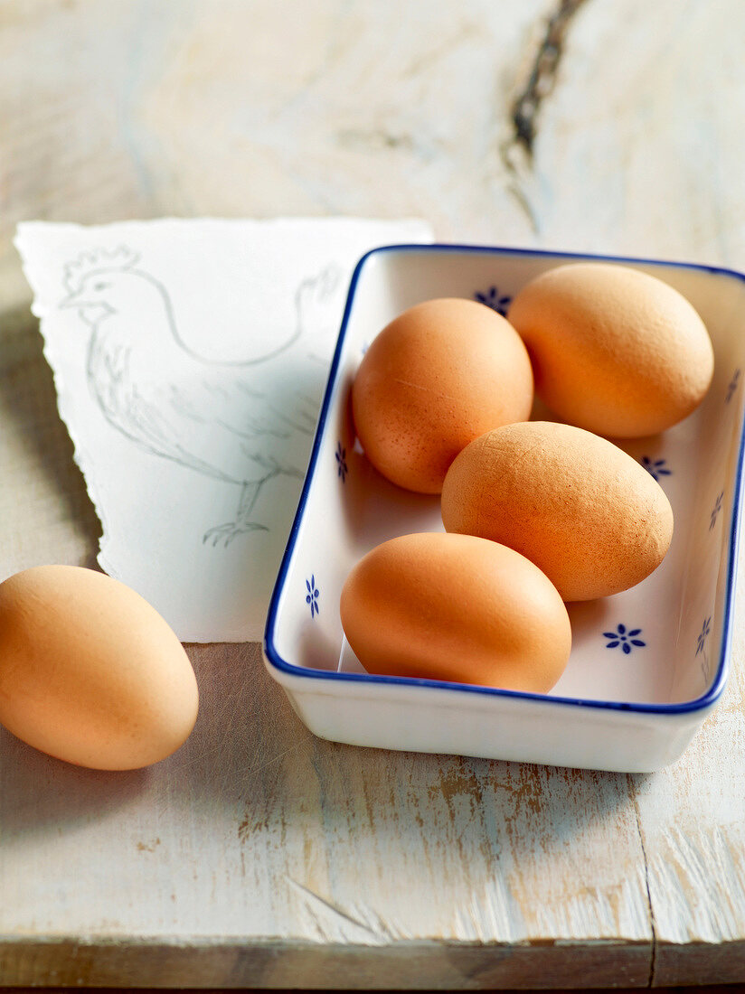 Close-up of chicken eggs in serving dish