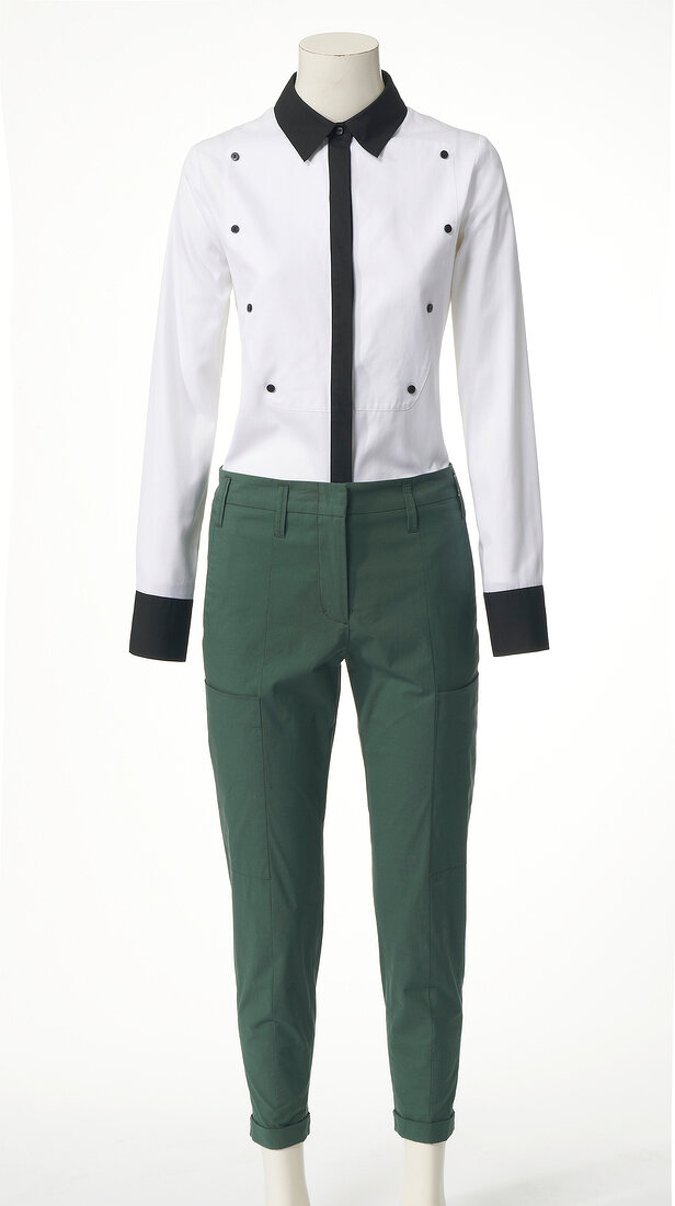 Black and white shirt and khaki trousers on mannequin