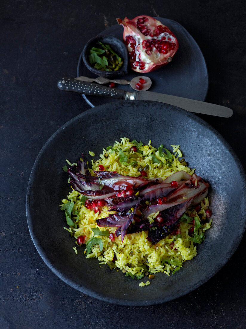 Saffron rice with radicchio in serving dish