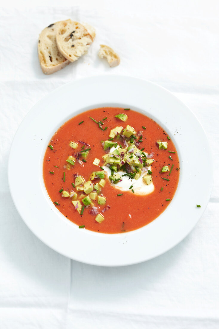 Tomato soup with avocado in serving dish