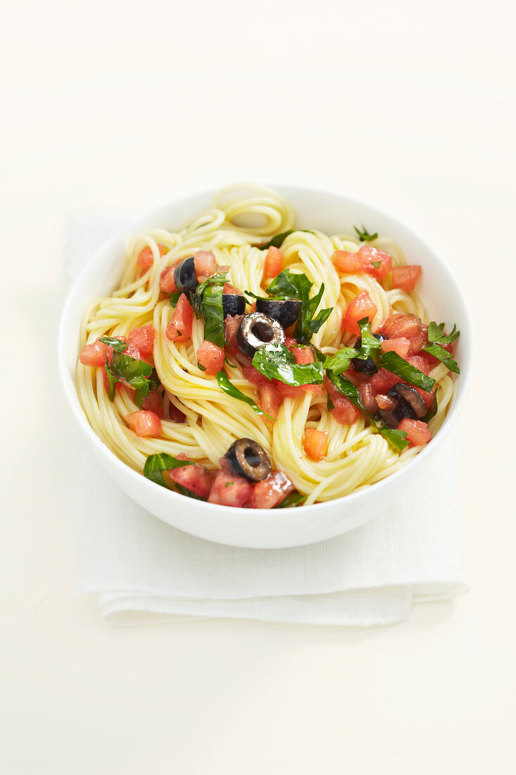 Spaghetti with tomato sauce in bowl